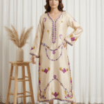 Jehanara ivory sheesha silk formal suit with resham embroidery and mirror work