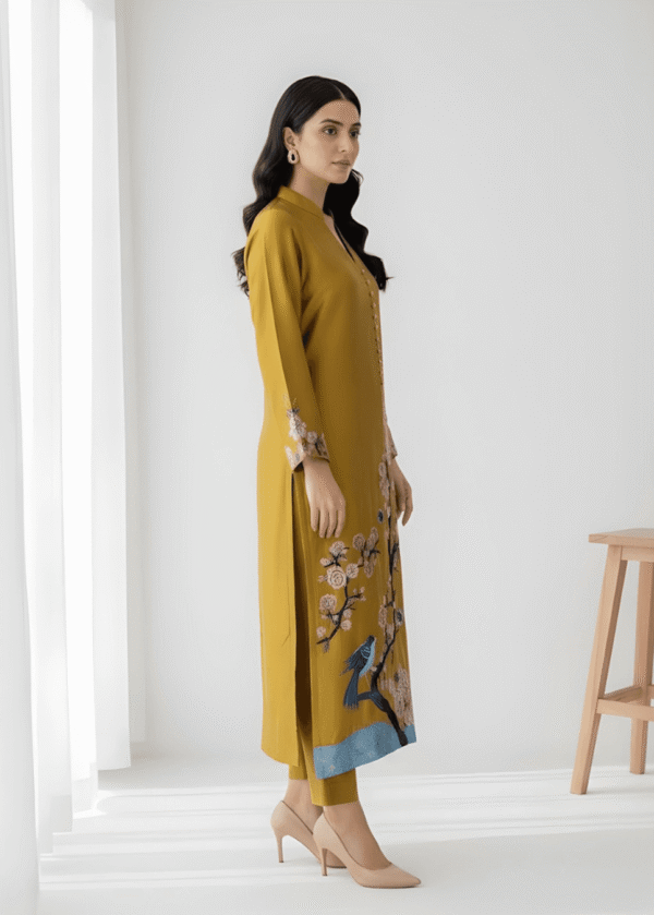 Resham embroidery on sleeves of mustard yellow formal suit