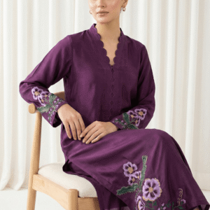 Close-up of resham hand embroidery bunches on plum purple formal suit