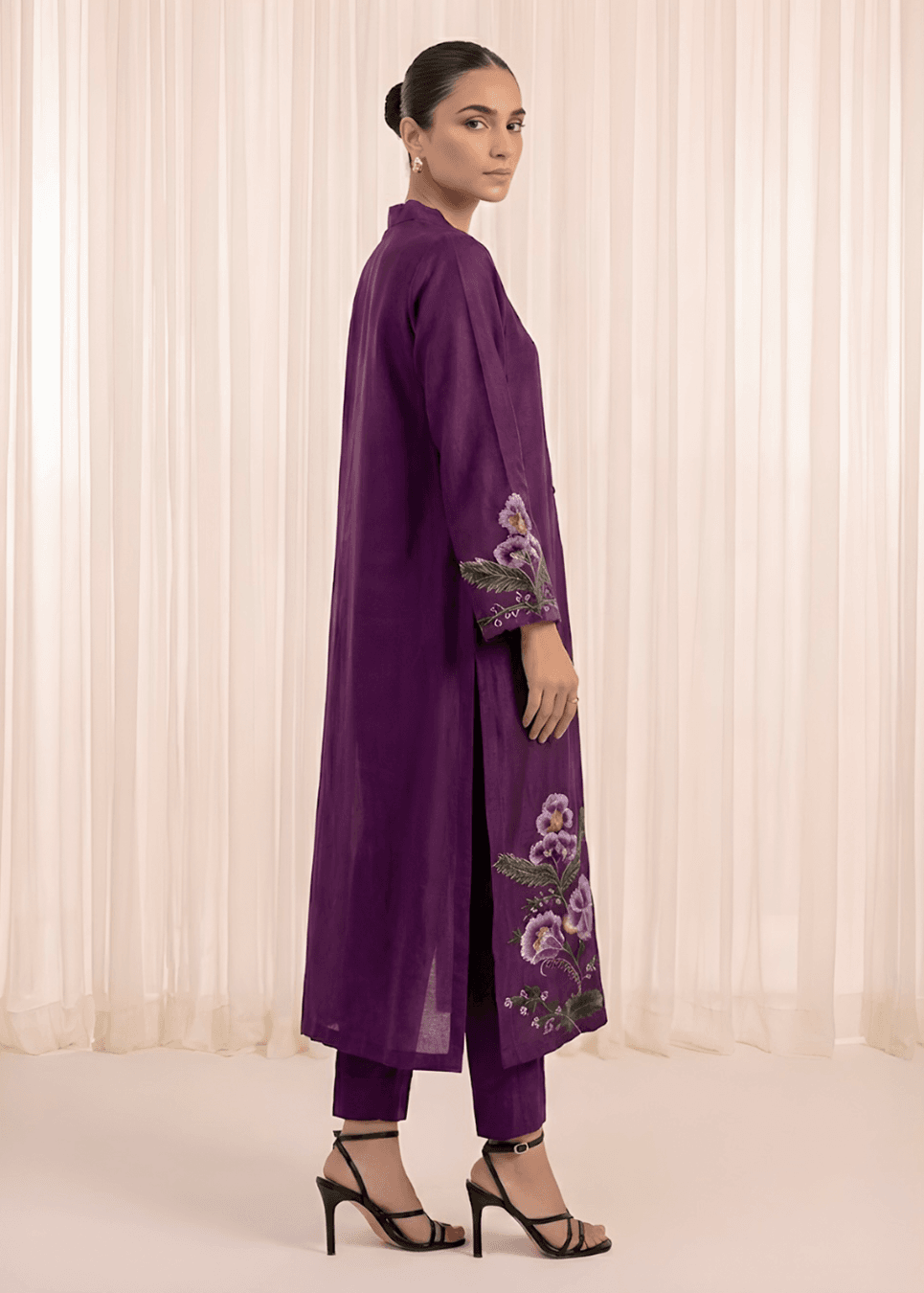 Resham thread embroidery on sleeves of plum purple sheesha silk suit